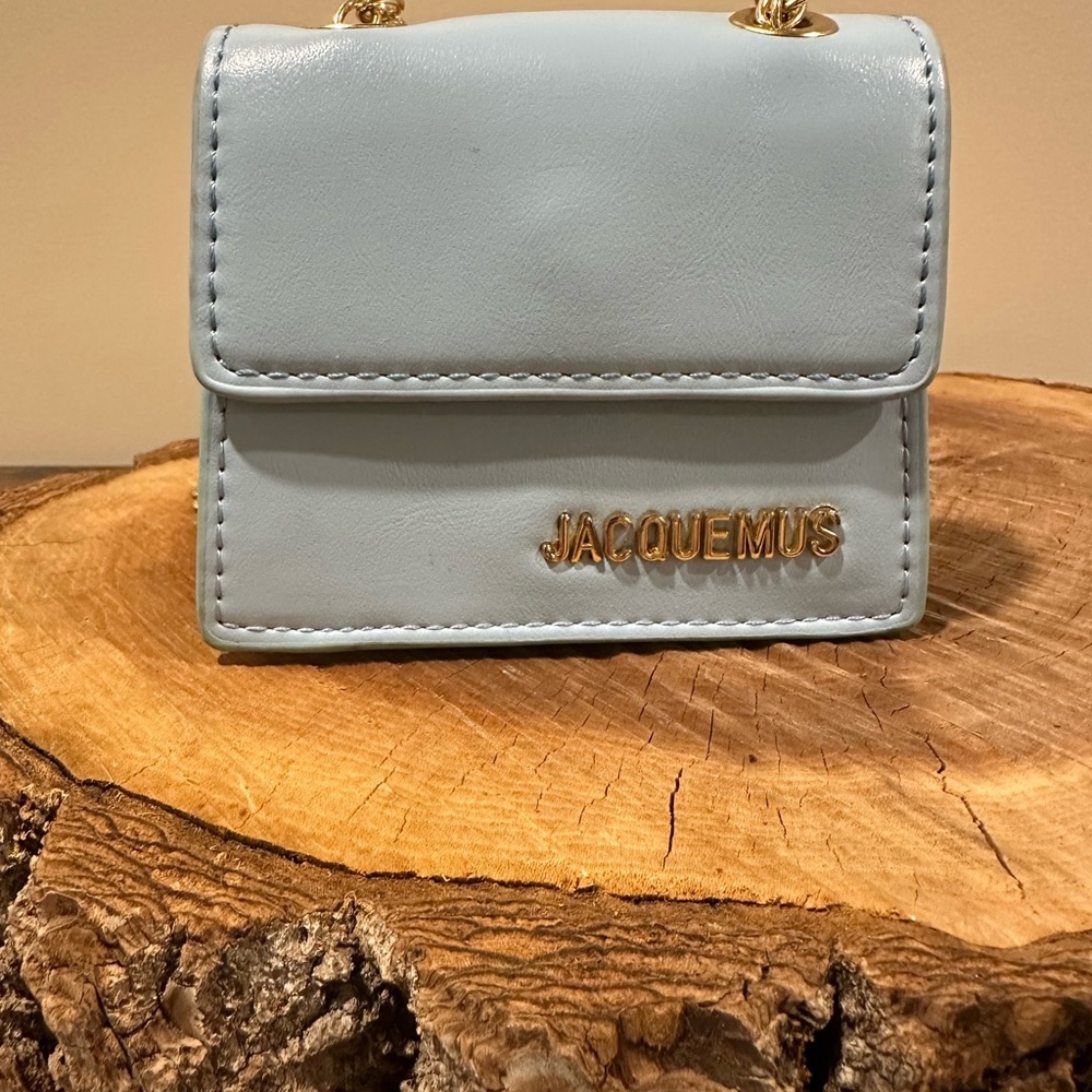 “Jacquemus” Pastel Blue Leather Mini Le Piccolo Chain Crossbody  gold chain.